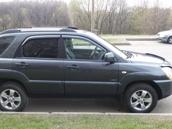 2009 Kia Sportage II Рестайлинг, серый - вид 2