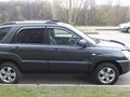 2009 Kia Sportage II Рестайлинг, серый - вид 2