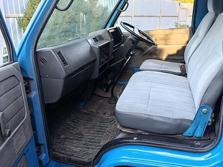 1989 Isuzu Elf (N-series), голубой, 720000 рублей, вид 3