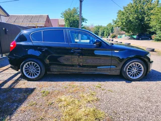 2011 BMW 1 серии 116i I (E81/E82/E87/E88) Рестайлинг, чёрный, 1050000 рублей, вид 2