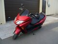 2005 Honda Forza, красный - вид 1