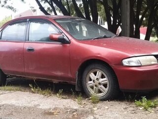 1997 Mazda Familia VII (BH), красный, 170000 рублей, вид 1