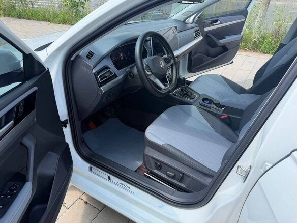2023 Volkswagen Lavida III Рестайлинг, белый, 1349990 рублей - вид 4