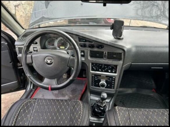 2011 Daewoo Nexia I Рестайлинг, чёрный, 289000 рублей - вид 3