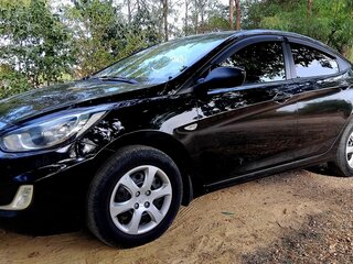 2011 Hyundai Solaris I, чёрный, 675000 рублей, вид 4