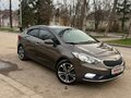 2016 Kia Cerato III Рестайлинг (Classic), коричневый, 1450000 рублей - вид 1
