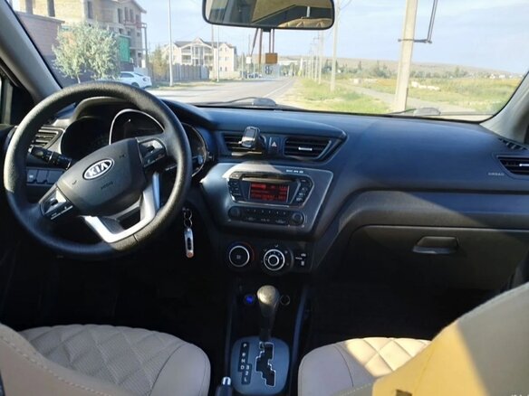 2012 Kia Rio 4-speed III, серый, 819000 рублей - вид 6