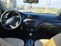 2012 Kia Rio 4-speed III, серый, 819000 рублей - вид 6