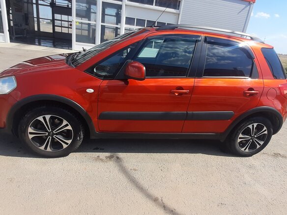 2013 Suzuki SX4 I (Classic) Рестайлинг, оранжевый, 1300000 рублей - вид 7