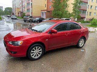 2010 Mitsubishi Lancer X, красный, 715000 рублей, вид 1