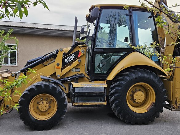 2013 Caterpillar 428, жёлтый, 5700000 рублей