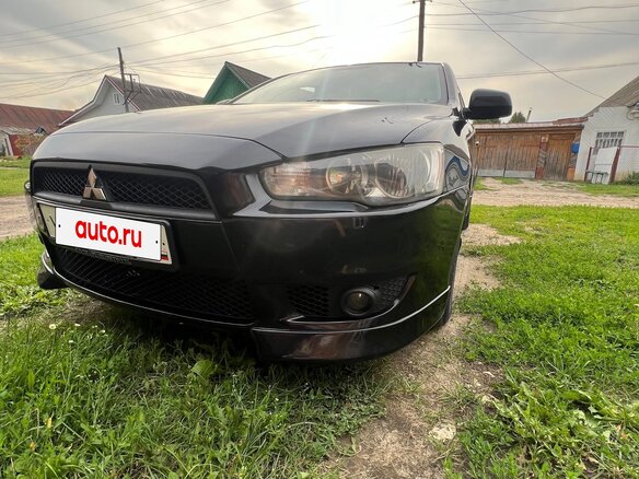 2008 Mitsubishi Lancer X, чёрный, 700000 рублей - вид 1