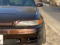 1995 Toyota Mark II VII (X90), коричневый, 2555552 рублей - вид 4