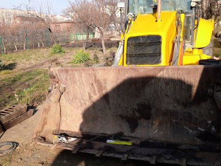 2007 New Holland B110B, жёлтый, 3699999 рублей, вид 5