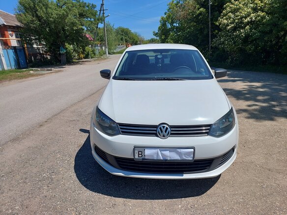 2011 Volkswagen Polo V, белый, 830000 рублей