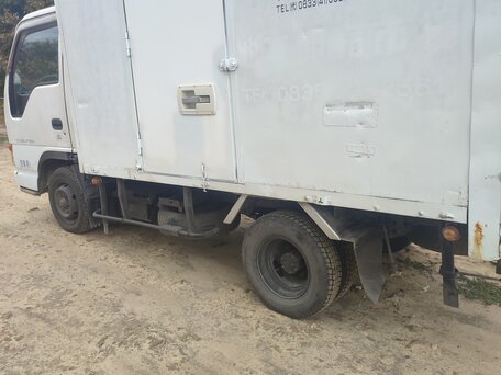1996 Isuzu Elf (N-series), белый, 700000 рублей, вид 3