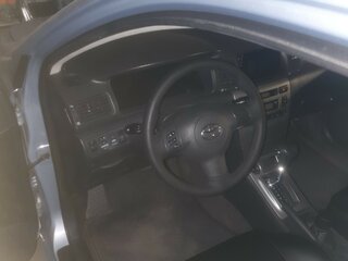 2005 Toyota Corolla IX (E120, E130) Рестайлинг, голубой, 650000 рублей, вид 3