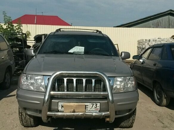 2000 Jeep Grand Cherokee II (WJ), серебристый