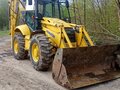 2005 Komatsu WB97S-2, жёлтый, 4400000 рублей