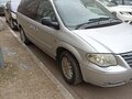 2005 Chrysler Voyager IV Рестайлинг, серебристый, 900000 рублей - вид 2