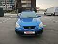 2009 Kia Rio II, синий, 550000 рублей - вид 1