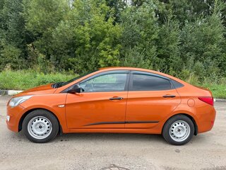 2015 Hyundai Solaris I Рестайлинг, оранжевый, 850000 рублей, вид 5