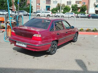 2005 Daewoo Nexia I, пурпурный, 95000 рублей, вид 3
