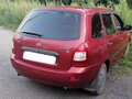 2009 Lada (ВАЗ) Kalina I, пурпурный, 135000 рублей - вид 2