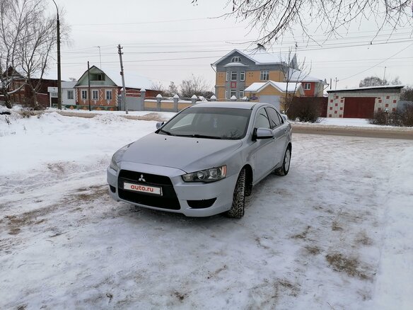 2008 Mitsubishi Lancer X, серебристый - вид 1