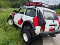 2010 Lada (ВАЗ) 2121 (4x4) I Рестайлинг, белый, 750000 рублей - вид 1