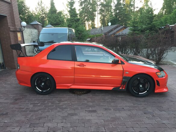 2003 Mitsubishi Lancer Evolution 5-speed VIII, красный - вид 1