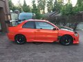 2003 Mitsubishi Lancer Evolution 5-speed VIII, красный - вид 1