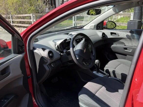 2012 Chevrolet Aveo II, красный, 750000 рублей - вид 5
