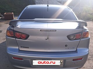 2012 Mitsubishi Lancer X Рестайлинг, серебристый, 895000 рублей, вид 3