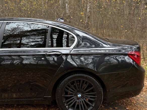 2009 BMW 7 серии 740d xDrive V (F01/F02/F04), чёрный, 1750000 рублей - вид 9