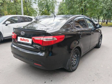 2012 Kia Rio 4-speed III, чёрный, 620000 рублей, вид 5