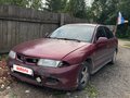1998 Mitsubishi Carisma I, красный