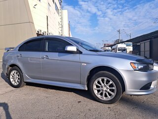 2012 Mitsubishi Lancer X Рестайлинг, серебристый, 895000 рублей, вид 5
