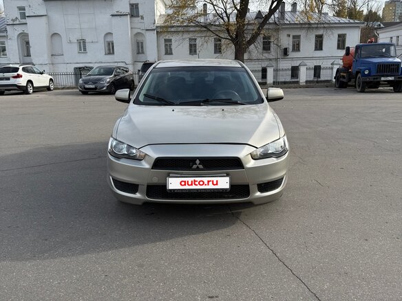 2009 Mitsubishi Lancer X, бежевый, 395000 рублей