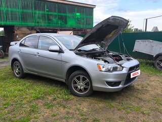 2010 Mitsubishi Lancer X, серебристый, 680000 рублей, вид 2