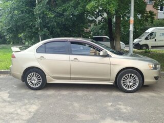 2007 Mitsubishi Lancer X, золотистый, 535000 рублей, вид 4