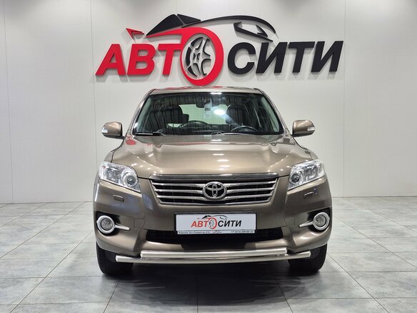 2011 Toyota RAV4 III (XA30) Рестайлинг, коричневый, 1690000 рублей - вид 2