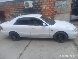 2001 Mazda Capella VI, белый, 290000 рублей, вид 2