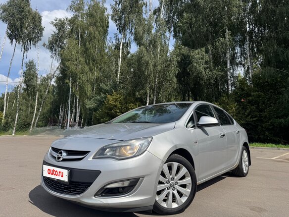 2013 Opel Astra J Рестайлинг, серебристый