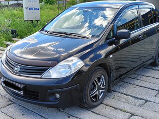 2010 Nissan Tiida I Рестайлинг, чёрный, 700000 рублей, вид 2