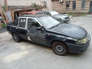 2012 Daewoo Nexia I Рестайлинг, чёрный, 130000 рублей, вид 3