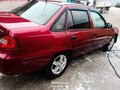 2012 Daewoo Nexia I Рестайлинг, пурпурный, 140000 рублей - вид 10
