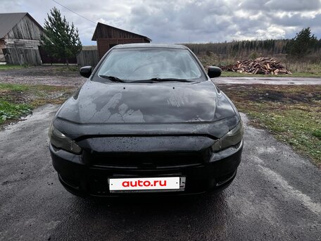 2008 Mitsubishi Lancer X, чёрный, 570000 рублей, вид 2