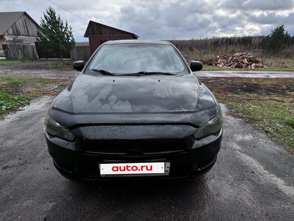 2008 Mitsubishi Lancer X, чёрный, 570000 рублей - вид 1