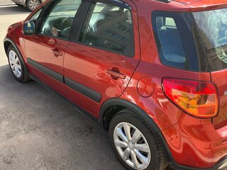 2010 Suzuki SX4 I (Classic) Рестайлинг, оранжевый, 700000 рублей, вид 5